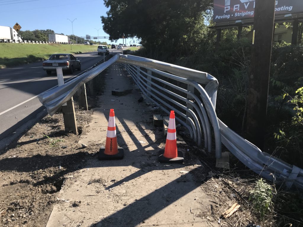 mangled guardrail at sidewalk over Walnut Creek